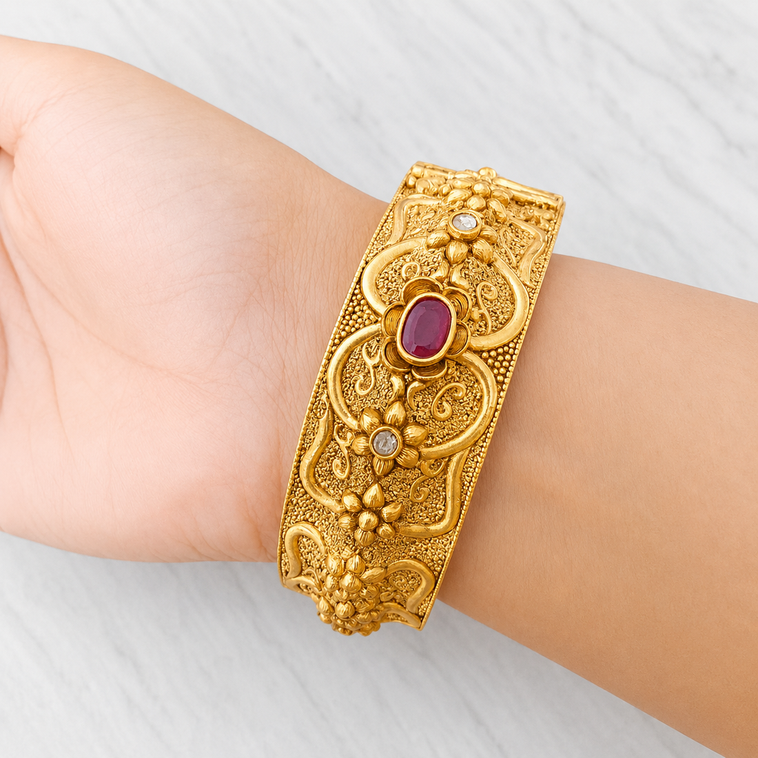 Intricate Gold Cuff with Ruby