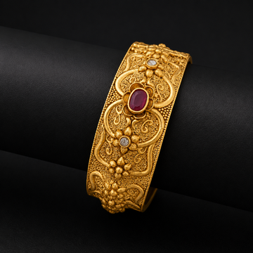 Intricate Gold Cuff with Ruby